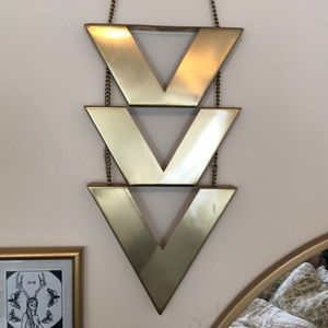 Gold finish metal chevron wall decoration